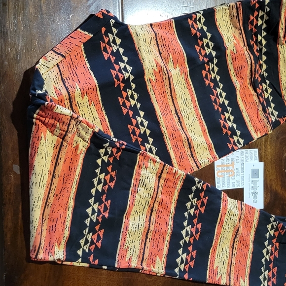 LuLaRoe Pants - LuLaRoe Black Leggings with Orange & Yellow Tribal Accents